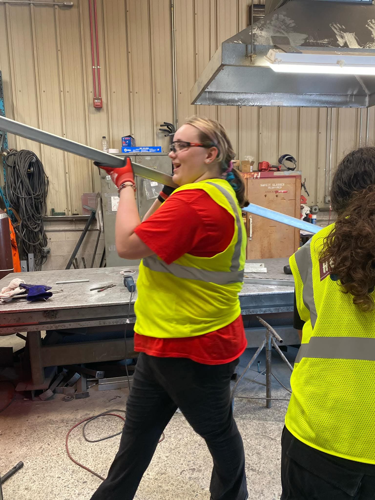 Kylee participating in a welding program